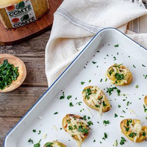 Geplette aardappelen gegrild op de BBQ met Comté